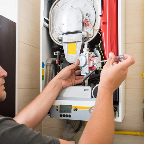 Gas plumber repair gas hot water systemin Townsville home